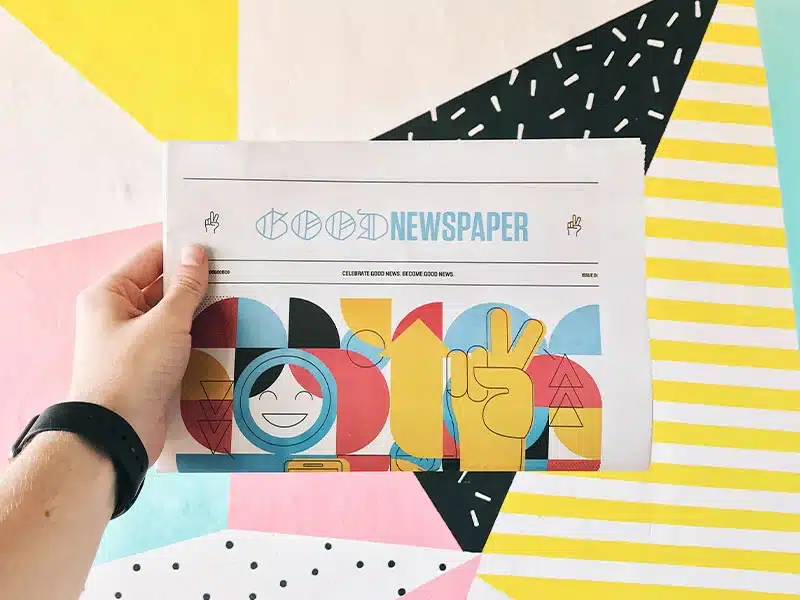 Person Holding Newspaper Person Holding Newspaper